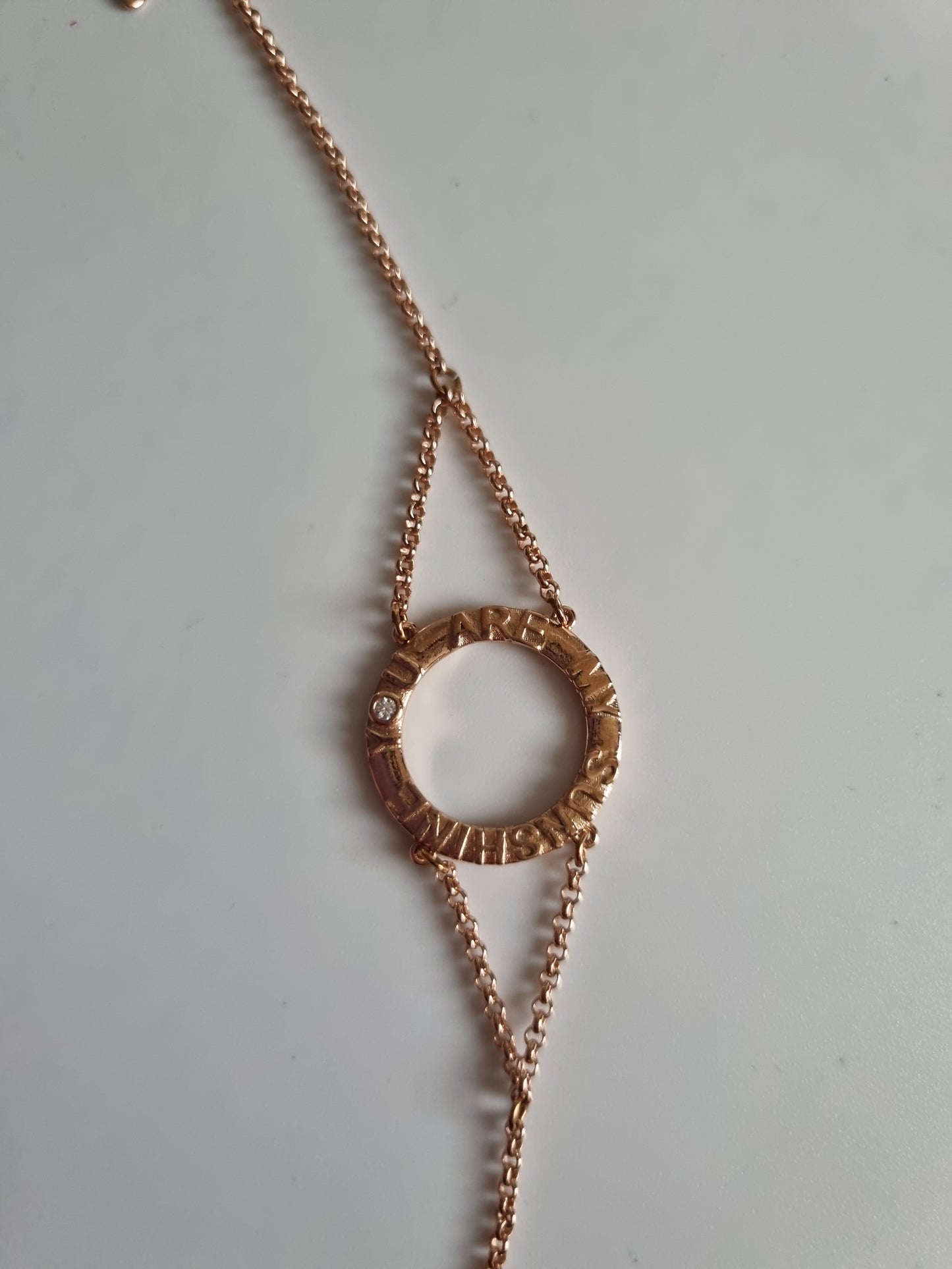 Rose gold plated chain bracelet with sw.crystal ( You are my sunshine)